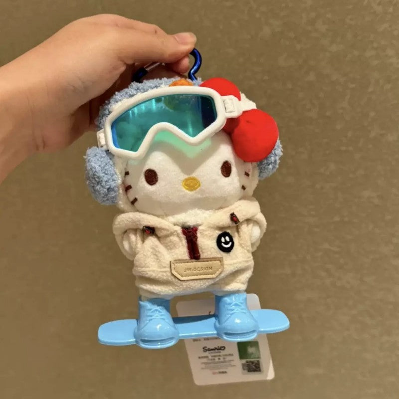 Hello Kitty plush bag charm wearing a snowboard outfit and goggles
