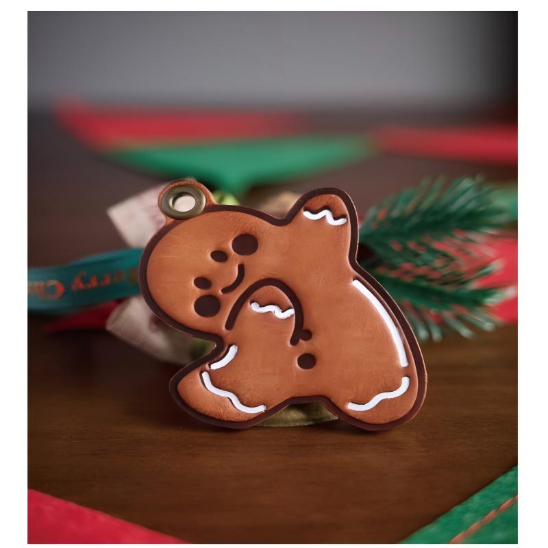 Gingerbread man leather charm close-up detail Pueblo leather