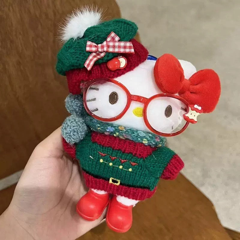 Hello Kitty plush charm wearing retro red and green holiday sweater and glasses
